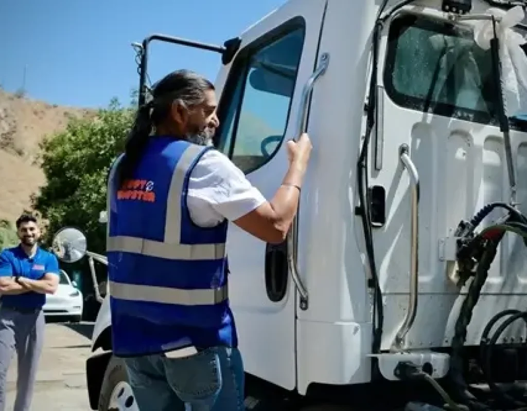Zippy Dumpster delivering rental container in Santa Clarita, CA neighborhood