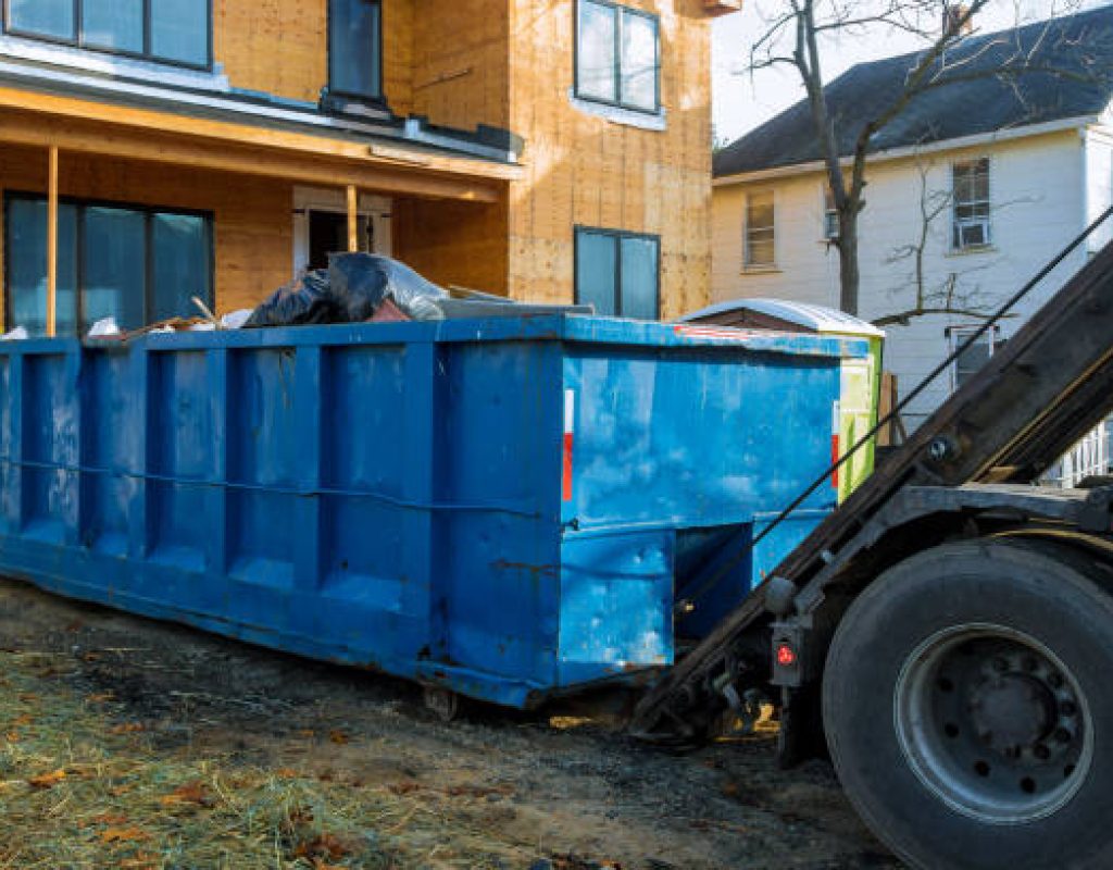 Zippy Dumpster delivering roll off dumpster to jobsite
